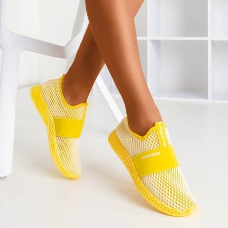 OUTLET Żółte sportowe buty damskie typu slip - on Andalia - Obuwie