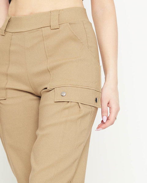 Beżowe damskie spodnie bojówki ze ściągaczami - Odzież