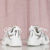 Białe buty sportowe ze srebrnymi wstawkami Irrmessia - Obuwie