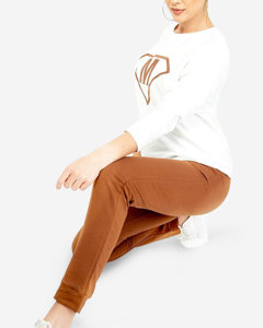 Biało- brązowy damski sportowy komplet dresowy z naszywką - Odzież
