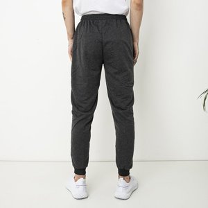 Ciemnoszare męskie spodnie dresowe z napisami - Odzież