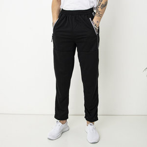 Czarne męskie spodnie dresowe z kieszeniami - Odzież
