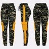 Damskie spodnie dresowe moro z żółtą wstawką - Spodnie