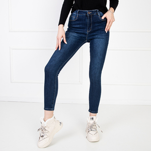 Granatowe damskie jeansy typu rurki - Odzież