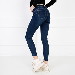 Granatowe damskie jeansy typu rurki z wysokim stanem - Odzież