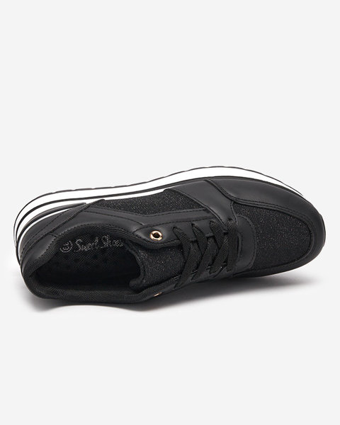 Чорне жіноче спортивне взуття Uzzuci- Взуття