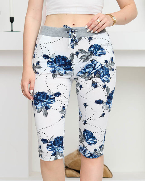 Квіткові жіночі шорти довжиною 3/4 білого та темно-синього PLUS SIZE - Одяг