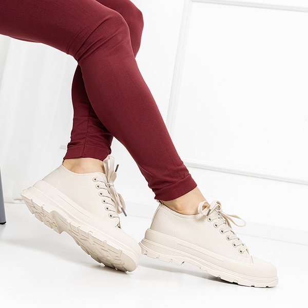 OUTLET Кремові жіночі спортивні кросівки Isidu - Взуття